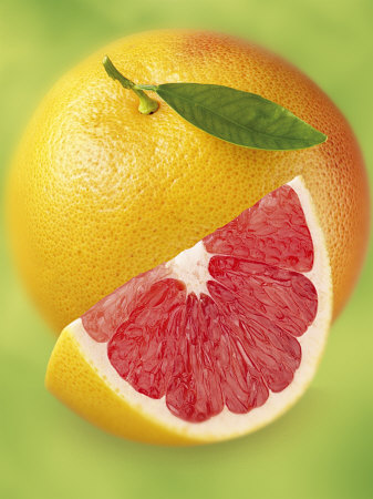 Grapefruit and Wedge of Grapefruit with Pink Flesh